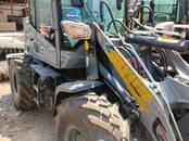 Погрузчики фронтальные, Фото