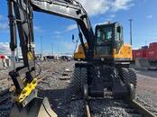 Экскаваторы колёсные, Фото